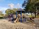 Community playground featuring slides, climbing structures, and ample play space for outdoor fun and recreation at 2820 Pankaw Ln, Valrico, FL 33596