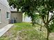 The backyard with some mature trees, providing shade and natural beauty to the property at 2820 Pankaw Ln, Valrico, FL 33596