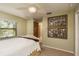 Bedroom with comfortable bed, window view, closet, and charming decor for a relaxing space at 3138 Edgemoor Dr, Palm Harbor, FL 34685