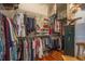 Large walk-in closet with ample storage and organization, plus a safe for valuables at 3138 Edgemoor Dr, Palm Harbor, FL 34685