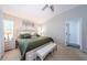 Spacious main bedroom featuring a neutral color palette, comfortable furnishings, and bright windows at 382 Tavernier Cir, Oldsmar, FL 34677