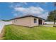 Spacious backyard with a screened lanai and white fence offering privacy and a great outdoor living space at 3914 Round Table Ct, Land O Lakes, FL 34638