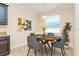 Cozy dining room with stylish decor, a round table, and ample natural light at 3914 Round Table Ct, Land O Lakes, FL 34638
