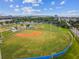 Aerial view of baseball fields and playground showcasing the recreational facilities within the neighborhood community at 3922 Fontainebleau Dr, Tampa, FL 33634