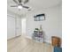 Bedroom showcasing a large closet, modern light fixture, and sleek, minimalist decor at 3922 Fontainebleau Dr, Tampa, FL 33634