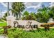 Community sign surrounded by lush tropical landscaping at 3922 Fontainebleau Dr, Tampa, FL 33634