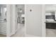 Hallway view showcasing the home's layout, connecting the bathroom and bedroom spaces at 3922 Fontainebleau Dr, Tampa, FL 33634