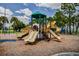Vibrant playground featuring slides and climbing structures, providing a fun and engaging space for children in the area at 3922 Fontainebleau Dr, Tampa, FL 33634