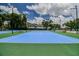 Beautiful neighborhood tennis courts on a sunny day, with benches and greenery nearby for a relaxing experience at 3922 Fontainebleau Dr, Tampa, FL 33634