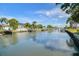 Beautiful waterfront view with boats docked along the canal, showcasing a serene and desirable location at 3922 Fontainebleau Dr, Tampa, FL 33634