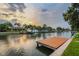 Scenic waterfront view with docks, boats, and calm waters, offering a tranquil and picturesque setting at 3922 Fontainebleau Dr, Tampa, FL 33634