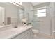 Bathroom boasts a glass enclosed shower and single sink at 4063 Ligustrum Dr, Palm Harbor, FL 34685