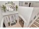 Bright foyer with high ceilings, decorative chandelier, and an abundance of natural light at 4063 Ligustrum Dr, Palm Harbor, FL 34685