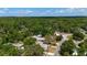Aerial view of property with verdant trees and natural sunlight creating pleasant shadows at 4112 Alafia Blvd, Brandon, FL 33511