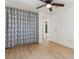 Bright bedroom with decorative curtains and an open door at 4112 Alafia Blvd, Brandon, FL 33511