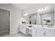 Bathroom with double vanity, ample storage, and elegant design at 4517 Foley Grove Dr, Valrico, FL 33596