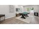 The spacious game room features a pool table, stylish decor, and bright, natural light at 4517 Foley Grove Dr, Valrico, FL 33596