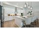 Bright eat-in kitchen showcases a center island, stainless steel appliances, and a modern design at 4517 Foley Grove Dr, Valrico, FL 33596
