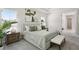 Comfortable main bedroom with soft textures, soothing color palette and plenty of natural light at 4517 Foley Grove Dr, Valrico, FL 33596