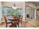 Dining area with large windows overlooking the pool and patio, offering great natural light at 5132 Pinnacle Dr, Oldsmar, FL 34677