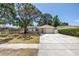 Charming single-story home with stone accents and concrete driveway at 518 62Nd Ne Ave, St Petersburg, FL 33702