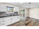 New kitchen features stainless appliances, granite countertops, and access to the backyard at 518 62Nd Ne Ave, St Petersburg, FL 33702