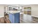Kitchen with a center island, stainless appliances, and a view to the backyard at 518 62Nd Ne Ave, St Petersburg, FL 33702