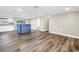 Inviting living room with wood look floors and neutral paint, perfect for relaxing at 518 62Nd Ne Ave, St Petersburg, FL 33702
