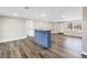 Bright living room with wood look floors and plenty of space for entertaining at 518 62Nd Ne Ave, St Petersburg, FL 33702