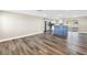 Spacious living room with open floor plan, lots of natural light, and wood look floors at 518 62Nd Ne Ave, St Petersburg, FL 33702