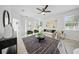Bright living room with neutral tones, elegant decor, and ample natural light at 5312 6Th N Way, St Petersburg, FL 33703