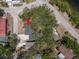 A charming single-story home boasts mature trees, and a convenient location near the neighborhood waterways at 5415 Park Pl, Tampa, FL 33603