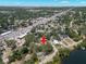 Aerial view of a property surrounded by mature trees, situated in a neighborhood with easy access to the highway at 5415 Park Pl, Tampa, FL 33603
