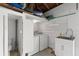 Basement with a utility sink, washer, and dryer at 5415 Park Pl, Tampa, FL 33603