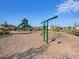 Community playground with multiple slides, swings, and climbing structures at 5464 Flint Hills Dr, Wimauma, FL 33598