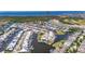 Breathtaking aerial view of waterfront homes along winding canals with ocean access and boat docks at 5717 Tybee Island Dr, Apollo Beach, FL 33572