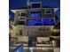 Multi-level backyard with seating areas and a luxurious pool at 5820 Balao S Way, St Pete Beach, FL 33706