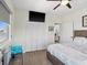 This bedroom offers a closet and TV, with a view of the water and natural light at 5820 Balao S Way, St Pete Beach, FL 33706