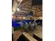 Tiki hut with dining table, outdoor kitchen and marine life decor with a pool view at 5820 Balao S Way, St Pete Beach, FL 33706