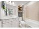 This bathroom features a shower-tub combo and a vanity with storage at 6206 Mooring Line Cir, Apollo Beach, FL 33572