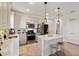 Modern kitchen with stainless steel appliances, quartz countertops and a pantry at 6206 Mooring Line Cir, Apollo Beach, FL 33572