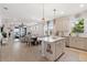 Spacious and open living area featuring a modern island and open-concept design at 6206 Mooring Line Cir, Apollo Beach, FL 33572