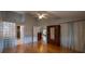 Bright bedroom boasts hardwood floors, ensuite access and large closet space at 6438 Brentwood Dr, Zephyrhills, FL 33542