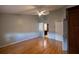 Spacious bedroom features hardwood floors, vaulted ceilings, and an ensuite bathroom at 6438 Brentwood Dr, Zephyrhills, FL 33542