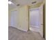 Sunny bedroom with a ceiling fan and a double door closet at 6440 Maiden Sea Dr, Apollo Beach, FL 33572