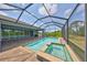 Enjoy this screened lanai with a sparkling pool and spa, perfect for entertaining or relaxing at 6440 Maiden Sea Dr, Apollo Beach, FL 33572
