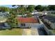 Single-story home with a backyard enclosed by a white fence, offering a private outdoor space at 8177 83Rd Ave, Seminole, FL 33777