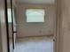 Bright bedroom featuring a large window for natural light and closet space at 8177 83Rd Ave, Seminole, FL 33777