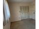Bedroom features a window, closet, and overhead lighting fixture at 8177 83Rd Ave, Seminole, FL 33777