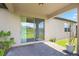 This is a view of the brick back patio and pond at 9309 Tradewater Oaks Ct, Riverview, FL 33578